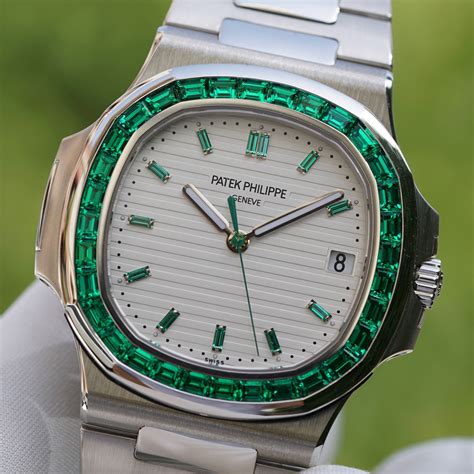 patek philippe nautilus travel time baguette diamond and emerald price|Patek Philippe Nautilus.